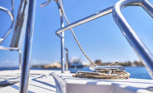 rope tied to a hand rail on a boat. what to do after a maritime injury